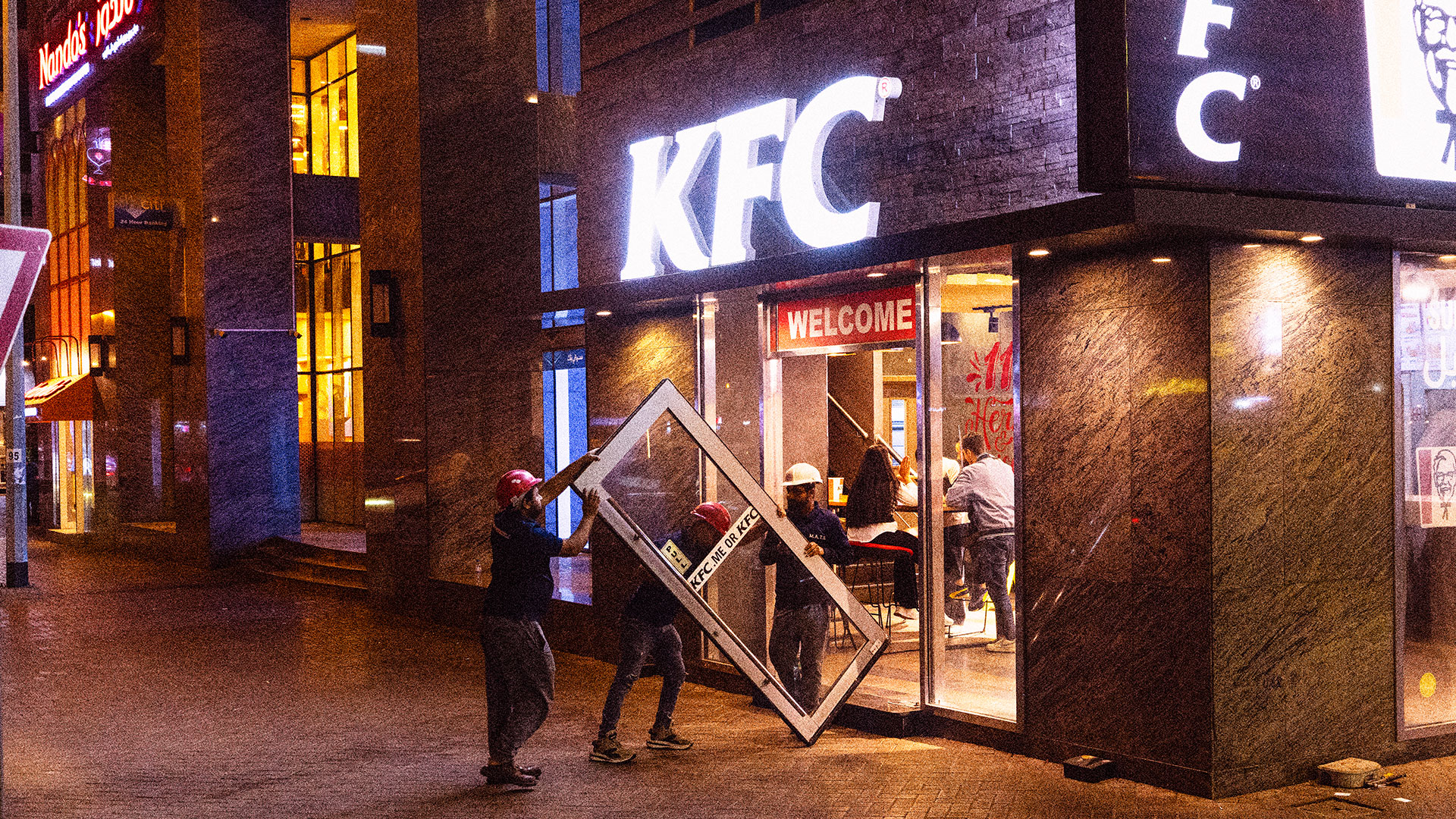 KFC GOES OPEN DOOR (OR NO DOOR) TO SIGNAL 24 HOURS OPENING