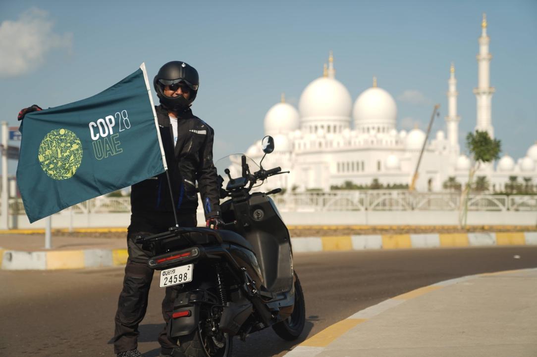 Ride to COP28: Adventurer Journeys Across 7 Emirates on an Electric Bike Without a Single Charge